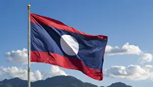 Blue Sky National Emblem Drucke: The flag of Laos flutters in the wind
