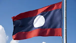 Asian National Emblem Drucke: The flag of Laos flutters in the wind