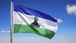 Digital Composing Of Flags Drucke: The flag of Lesotho, fluttering in the wind