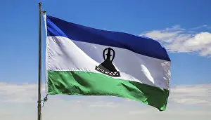 Digital Composing Of Flags Drucke: The flag of Lesotho, fluttering in the wind