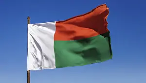 Flag Fluttering In Wind Drucke: The flag of Madagascar, fluttering in the wind
