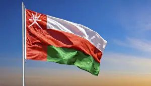 Western Asia State Flag Drucke: The flag of Oman flutters in the wind