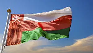 Oman Flag Drucke: The flag of Oman flutters in the wind