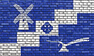 Deserted European Structure Drucke: Flag of Staining painted on brick wall