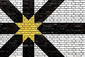 Scotland Landscape Photography Drucke: Flag of Sutherland painted on brick wall