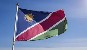 Flapping National Colours Drucke: Flags, the national flag of Namibia flutters in the wind