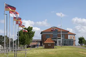 Fohr Island Germany Drucke: Flags next to the tourist information centre