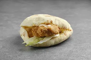Chicken Fillet Drucke: Flat bread with chicken fillet in breading