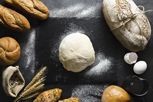 Black Background Food Photography Drucke: Flat lay dough bread black background