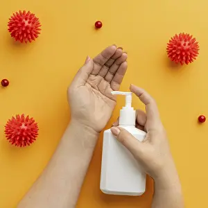 Virus Protection Image Drucke: Flat lay hands using liquid soap with viruses