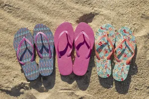 Summer Leisure Activity Drucke: Flat lay three pairs flip flops