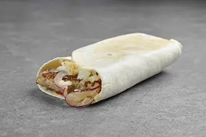 Unhealthy Meal Ideas Drucke: Flatbread rolled with with beef patty
