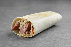 Grocery Store Food Images Drucke: Flatbread rolled with with thin sausage