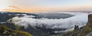 Steep Cliff Landscape Photography Drucke: Fog between the cliffs, clouds moving around