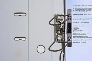 Home Office Setup Drucke: Folder with insurance document, top view