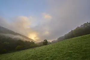 German Countryside Landscape Shot Drucke: Forest, valley, meadow, clouds