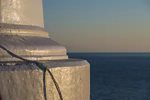 Atmospheric Evening Photography Drucke: Foundation of a lighthouse at sunset