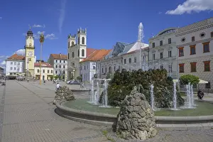 Central Europe Historic Quarter Image Drucke: Fountain on the main square behind the clock tower