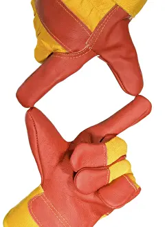Studio Shot Of Hard Hat Drucke: Frame made from red protective gloves