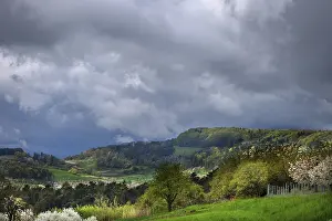 Cloudy Skies In Middle Europe Drucke: Franconian spring landscape, rain clouds