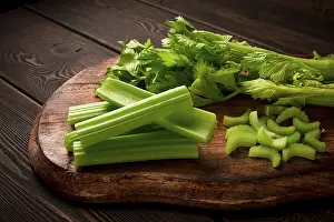 Dark Background Vegetables Drucke: Fresh bunch of celery, top view