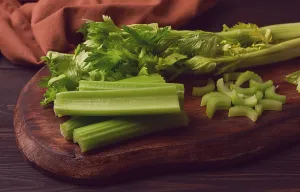 Dark Background Vegetables Drucke: Fresh bunch of celery, top view