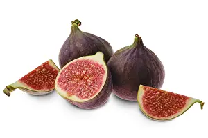 Deciduous Tree Fruits Drucke: Fresh figs, whole and segment isolated on white background