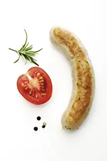 Cherry Tomato Drucke: Fried bratwurst with cherry tomato