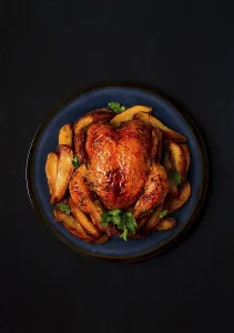 Black Background Food Drucke: Fried whole chicken, with potatoes