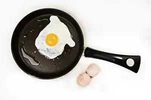 Still Life Images Drucke: Fried eggs in a pan