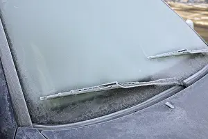 Hoarfrost Detail Drucke: Frost on a car in wintertime