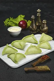 Traditional Italian Cooking Methods Drucke: Frozen dumplings with spinach