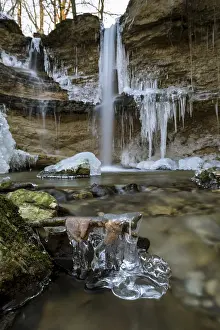 Central Europe Winter Scene Drucke: A frozen waterfall flows over rocks
