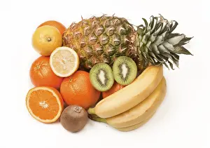 High Angle View Of Fruit Drucke: Fruit assortment, pineapple, kiwi