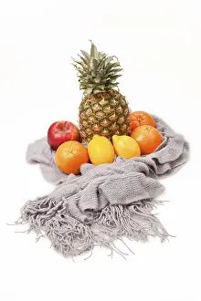Exotic Fruit Arrangement Drucke: Fruits presented on a scarf, a pineapple
