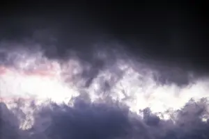 Cloudy Mood Landscape Drucke: Gap in a dark cloud formation