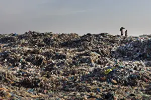Waste Management Issues Drucke: Garbage collector at garbage dump