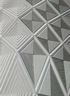 Modern Building Architecture Drucke: Geometric white patterns and cladding on wall of a modern building