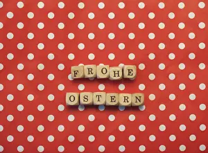 Symbolic Easter Picture Drucke: German words Happy Easter on dotted background