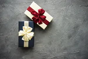 Symbolic Picture Of A Present Drucke: Gift box concept on rustic background with copy space