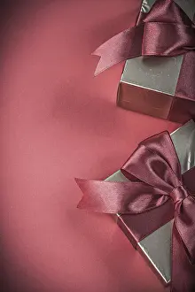 Christmas Gift Box Concept Drucke: Giftboxes on red background vertical version holidays concept