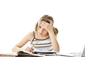 Female Student In Class Drucke: Girl doing homework, learning