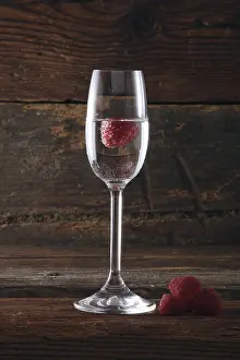 Alcoholic Beverage Nutrition Drucke: A glass of Himbeergeist, a raspberry schnaps