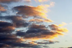 Sunset In Europe Drucke: Glowing clouds in the evening sky at sunset
