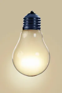 Electric Power Industry Drucke: Glowing lightbulb
