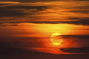 Dramatic European Landscape Drucke: Glowing sun, sunset with clouds