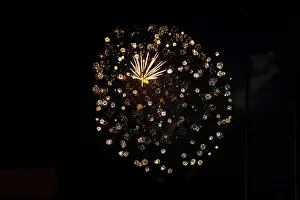 Lower Austria Night Shot Drucke: Gold-colored firework explosions in a dark sky