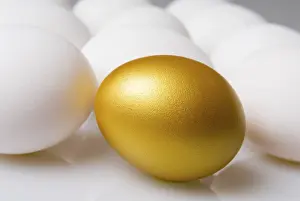 Easter Egg Still Life Photography Drucke: Golden easter egg between white eggs