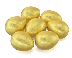 Christian Easter Traditions Drucke: Several golden Easter eggs isolated on white background