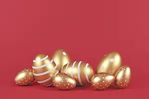 Traditional Easter Eggs Drucke: Golden Easter eggs with simple stripe and dot pattern on red background with copy space